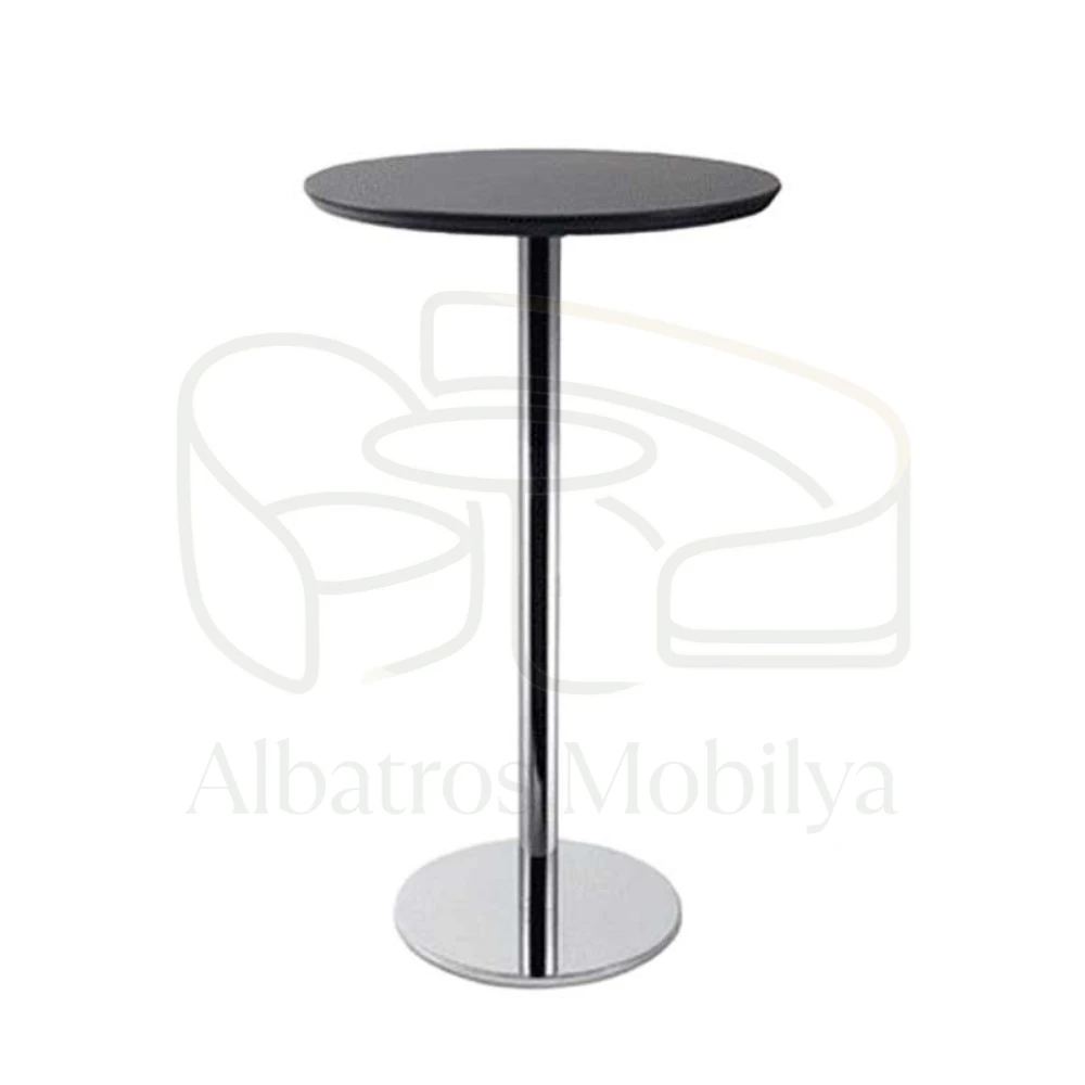 Table de bar Albatros Mobilya modèle 09 ; Il offre une silhouette simple avec son plateau rond foncé, ses pieds fins brillants et sa base ronde.
