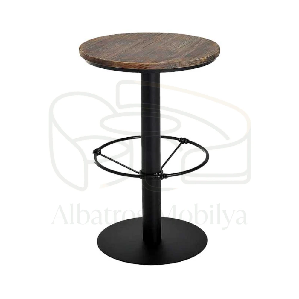 Table de bar Albatros Mobilya modèle 12 ; Il se distingue par son plateau rond à motifs de bois foncé, son pied central noir et son support de pied en forme d'anneau.